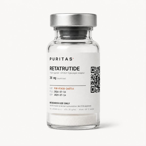 Puritas Retatrutide 30 mg vial containing a white lyophilized cake, label showing lot PUR-RTA30-260714 and a QR code